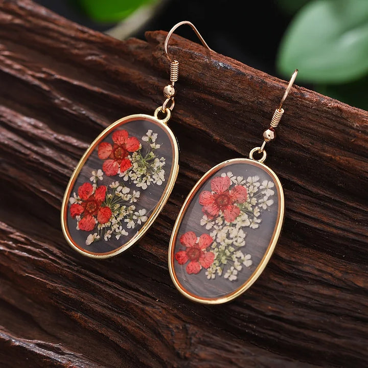 Brincos vintage com design floral oval feito à mão