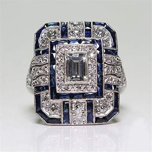 Anel vintage em prata brilhante e zircônia azul