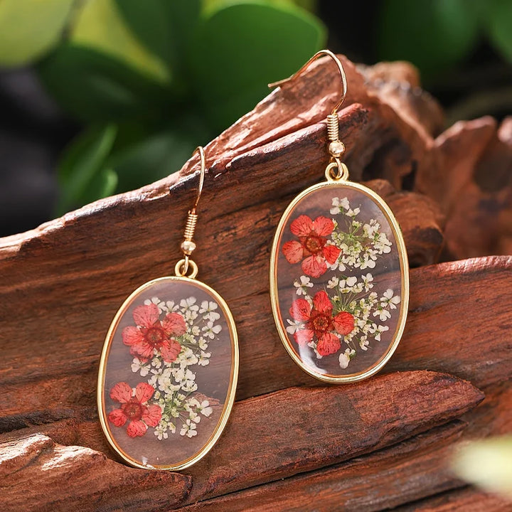 Brincos vintage com design floral oval feito à mão