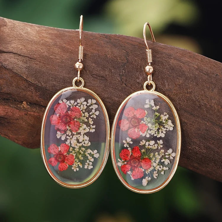 Brincos vintage com design floral oval feito à mão
