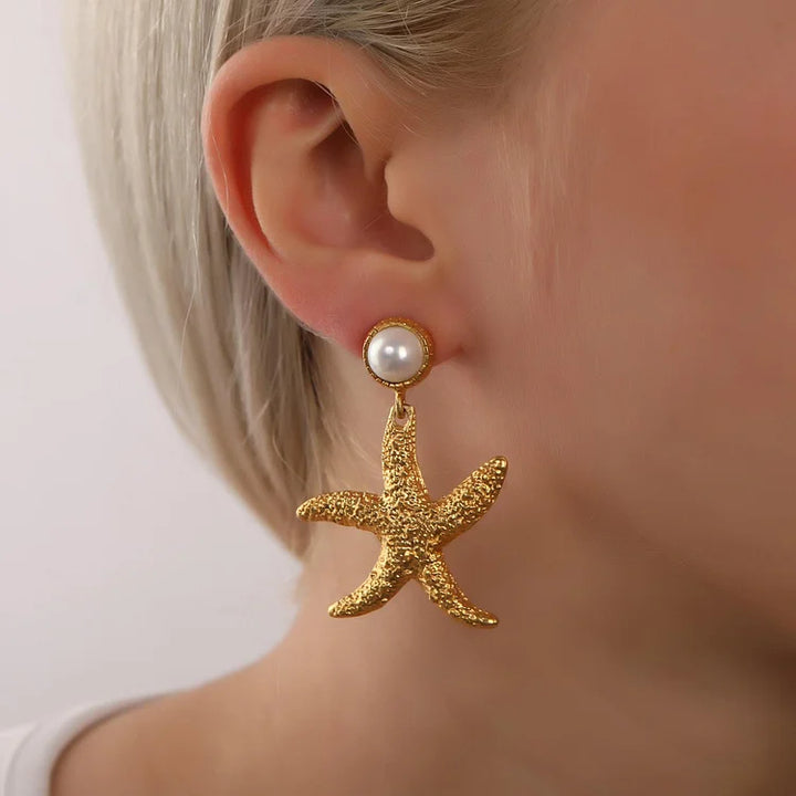 Brincos vintage de pérolas e estrelas do mar feitos à mão