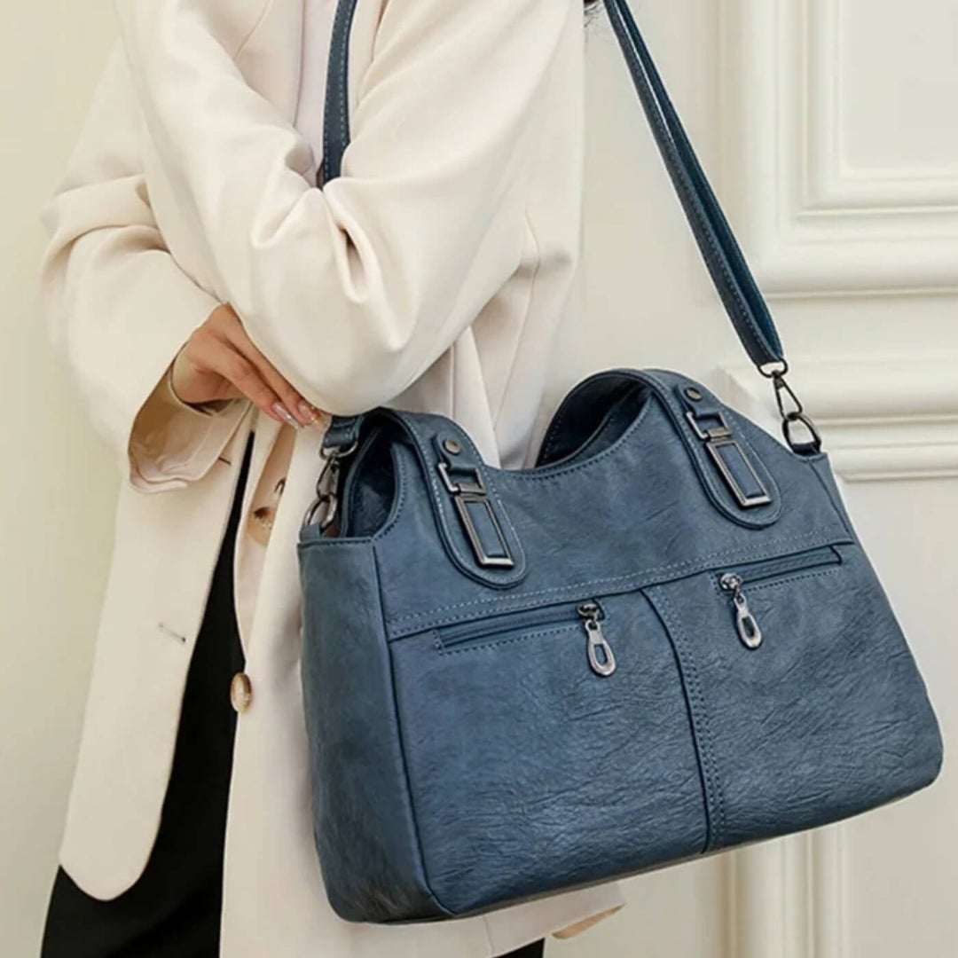Bolsa de Ombro Dual-Zip da Flavia