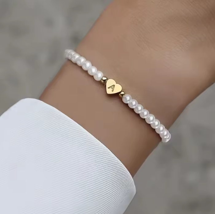 Bracelete Letra | Origens