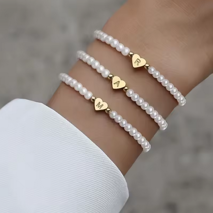 Bracelete Letra | Origens