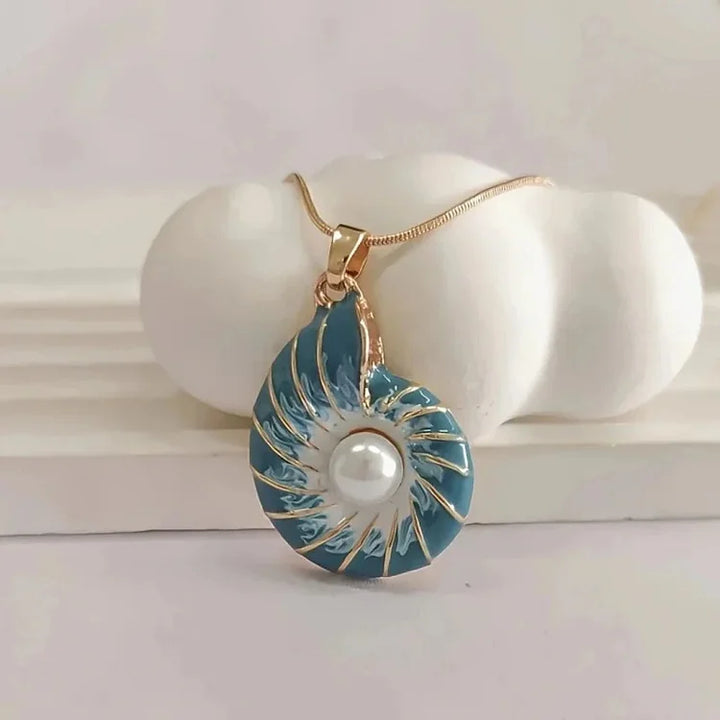 Colar de pérolas com concha de óleo de gotejamento