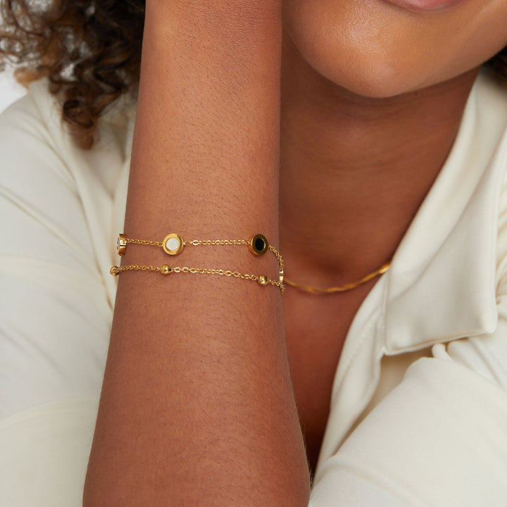 Pulseira de Ônix e Pedra Branca